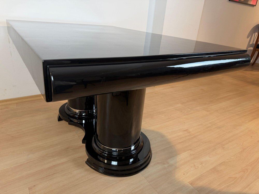 Art Deco dining table in black piano lacquer & metal, 1930