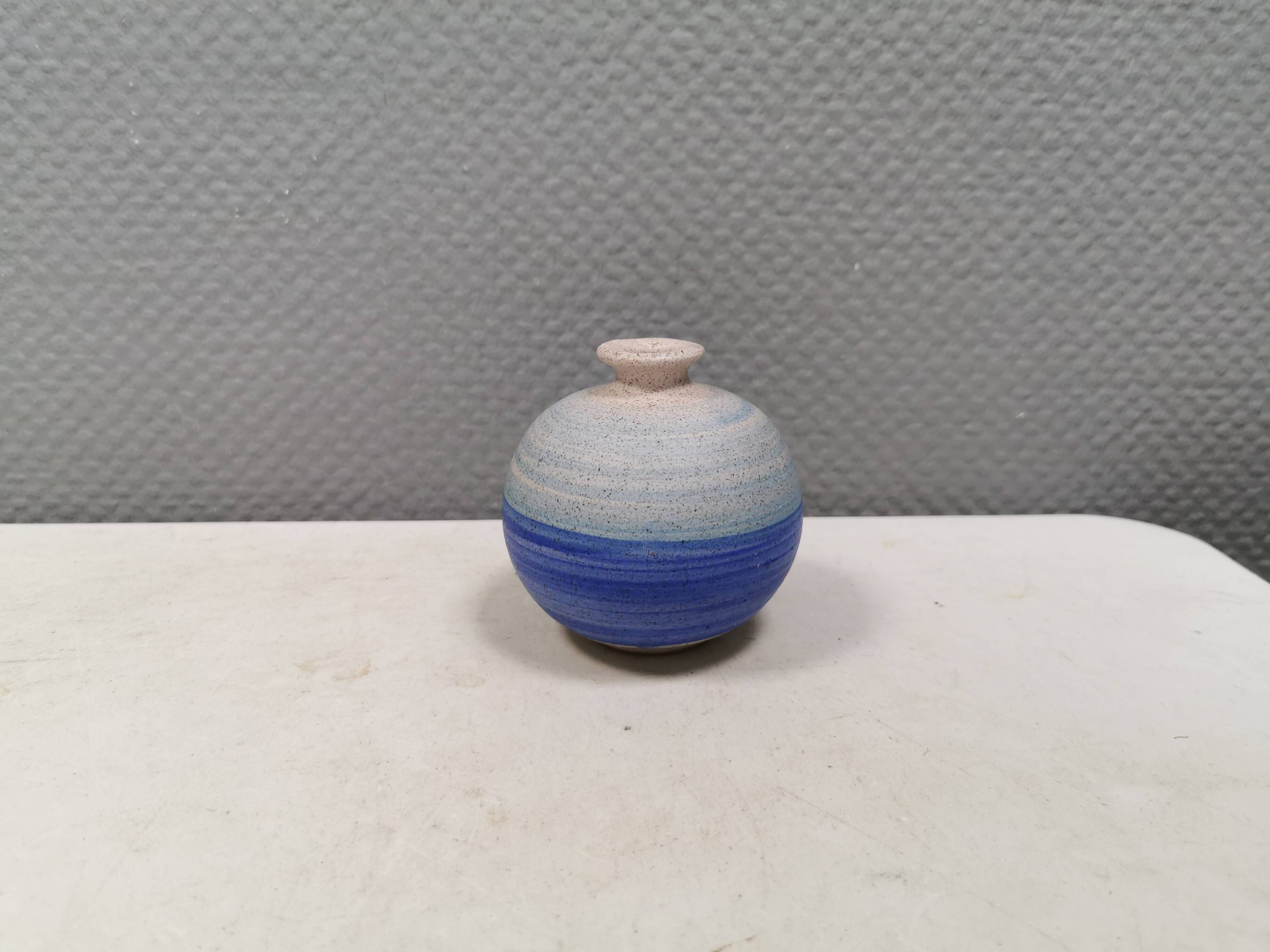 A small, round, beautiful ceramic vase from Denmark, dating from the 1980s.