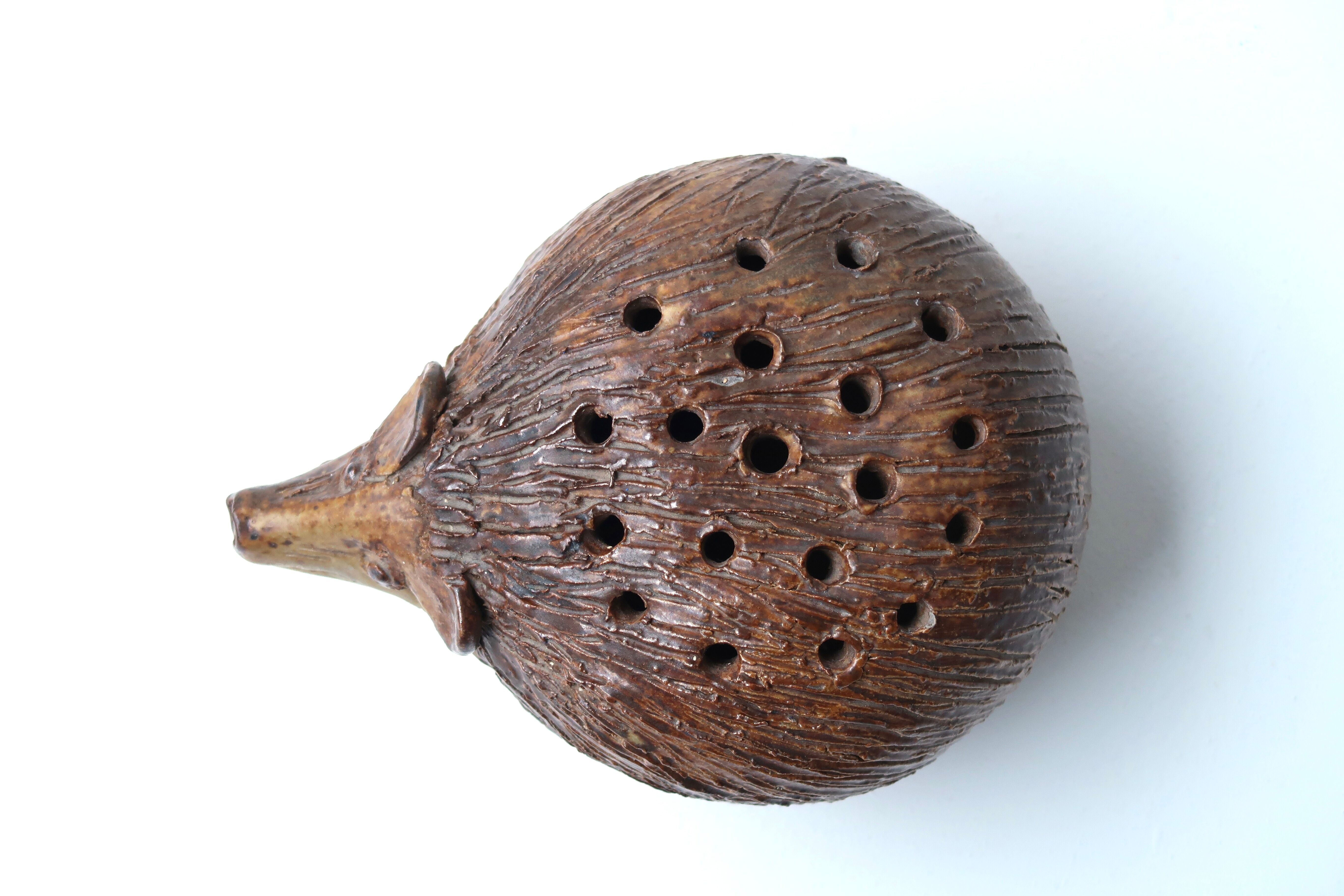 Ceramic hedgehog flower pick by Jacky Coville