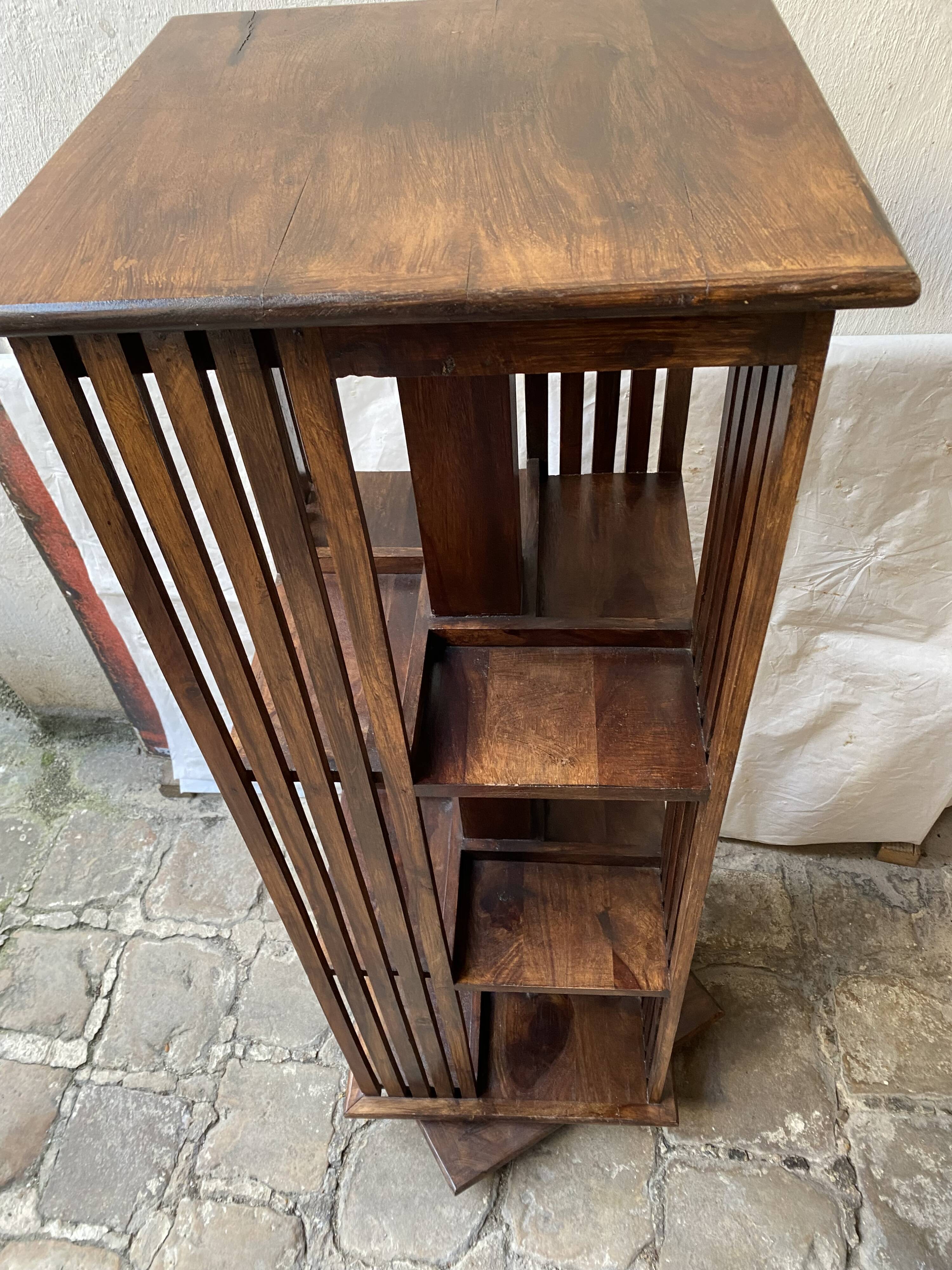 Pivoting column library in mahogany, 20th century.