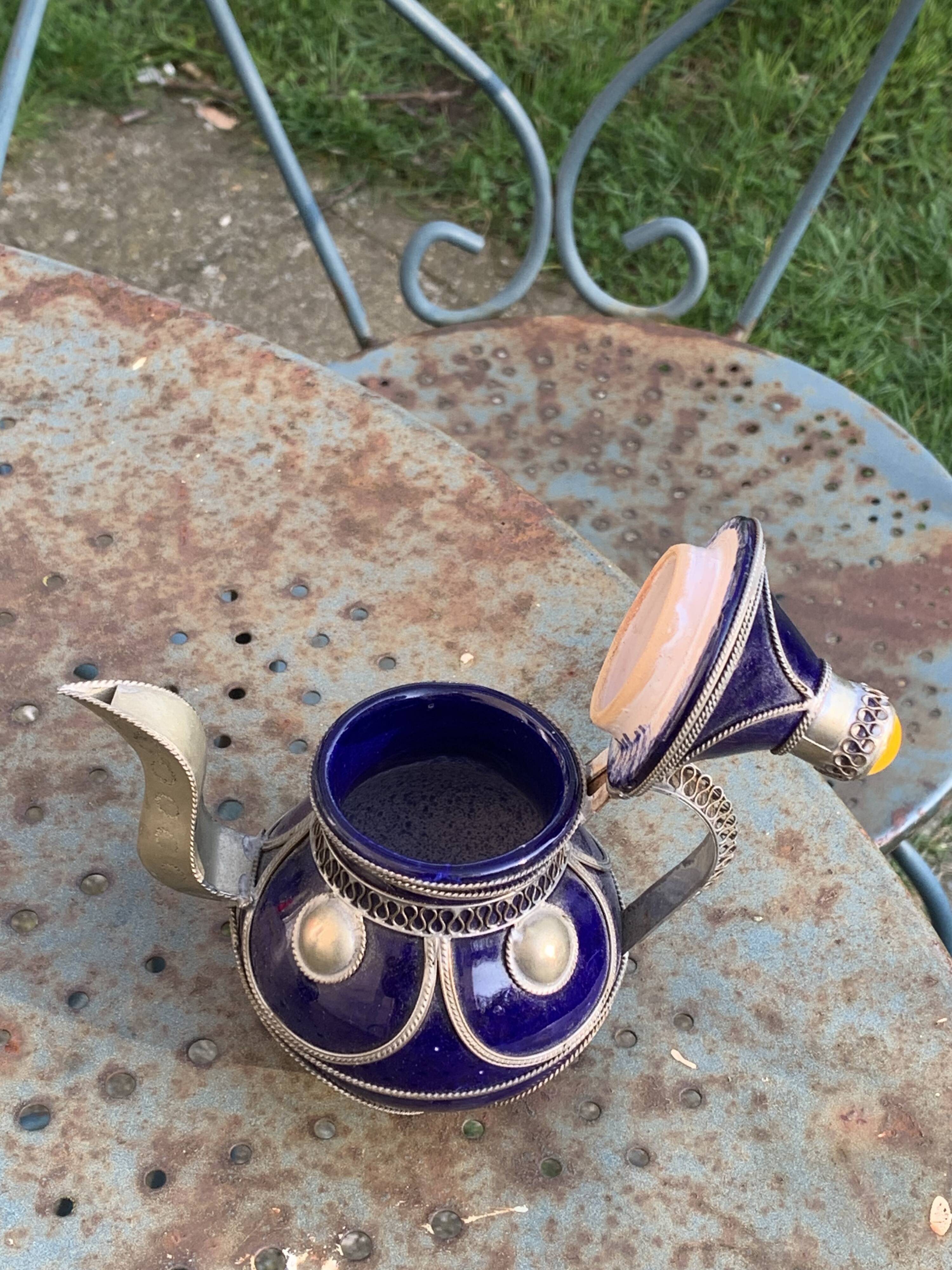 Vase and small teapot in cobalt blue enameled ceramic with artisanal and oriental pewter inserts