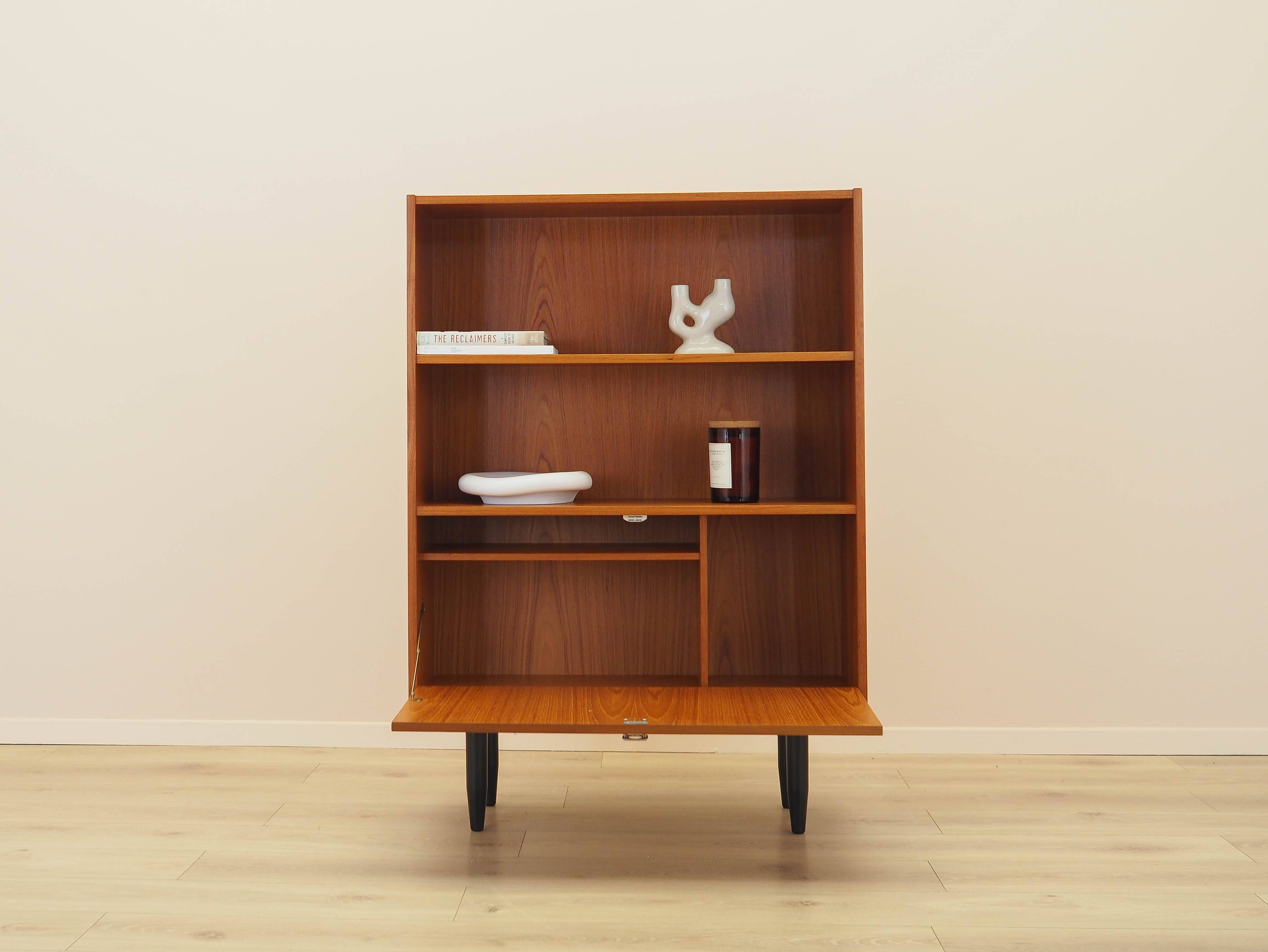 Danish teak-veneered bookcase with a bar and adjustable shelves, 1970s.