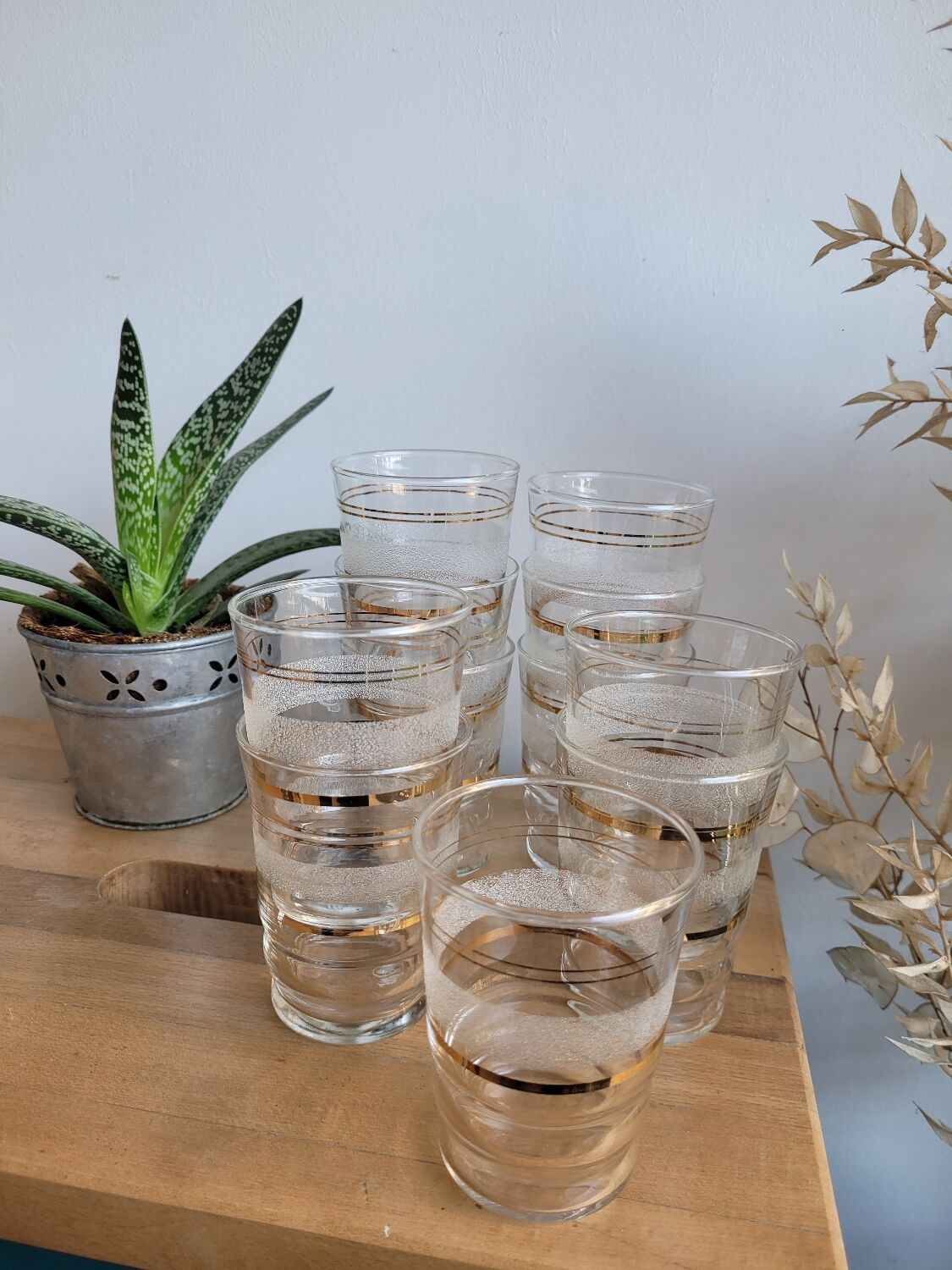 Set of 11 granite glass cups and golden edging