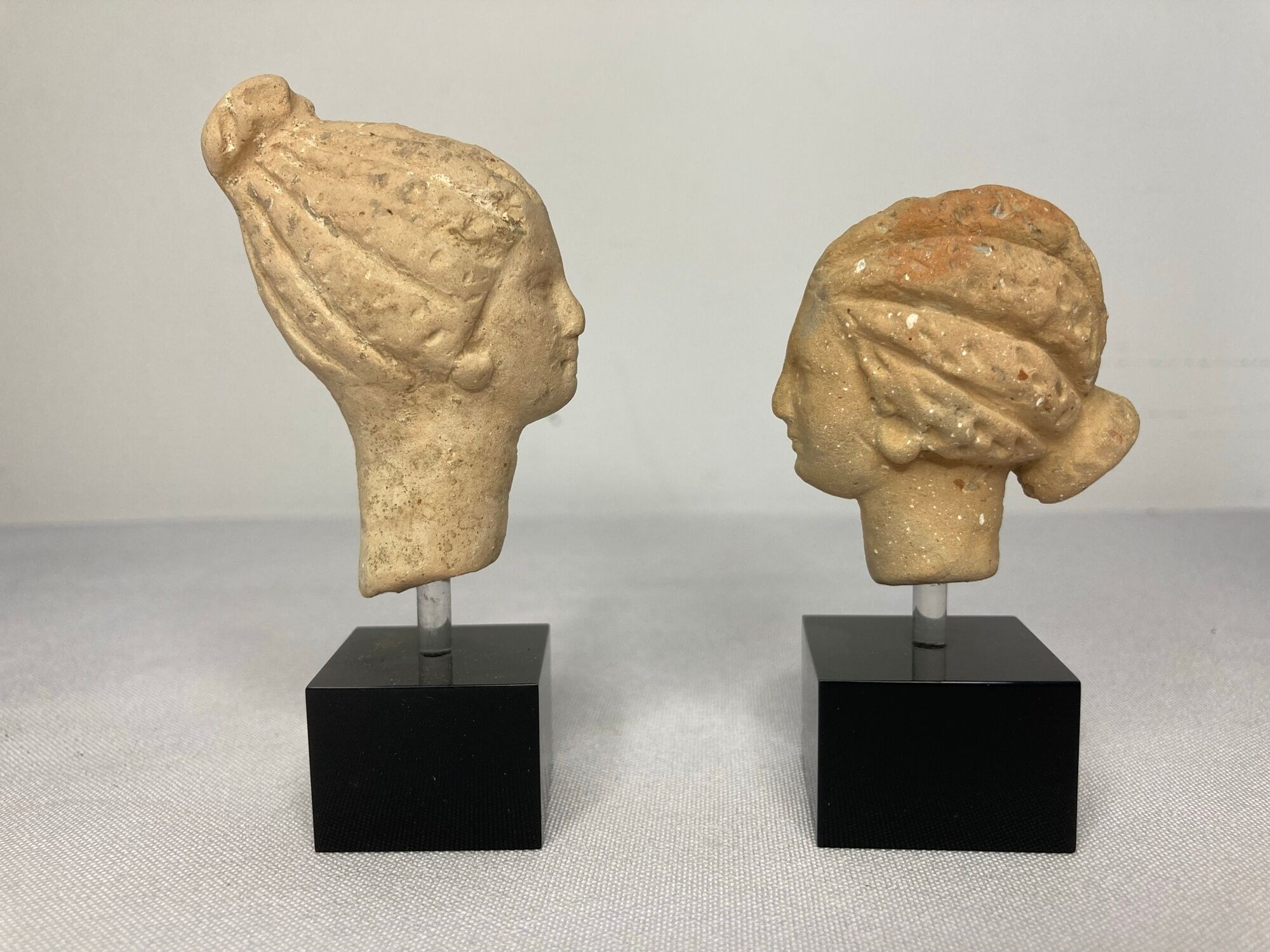 Antiquity two heads Greek woman with terracotta bun