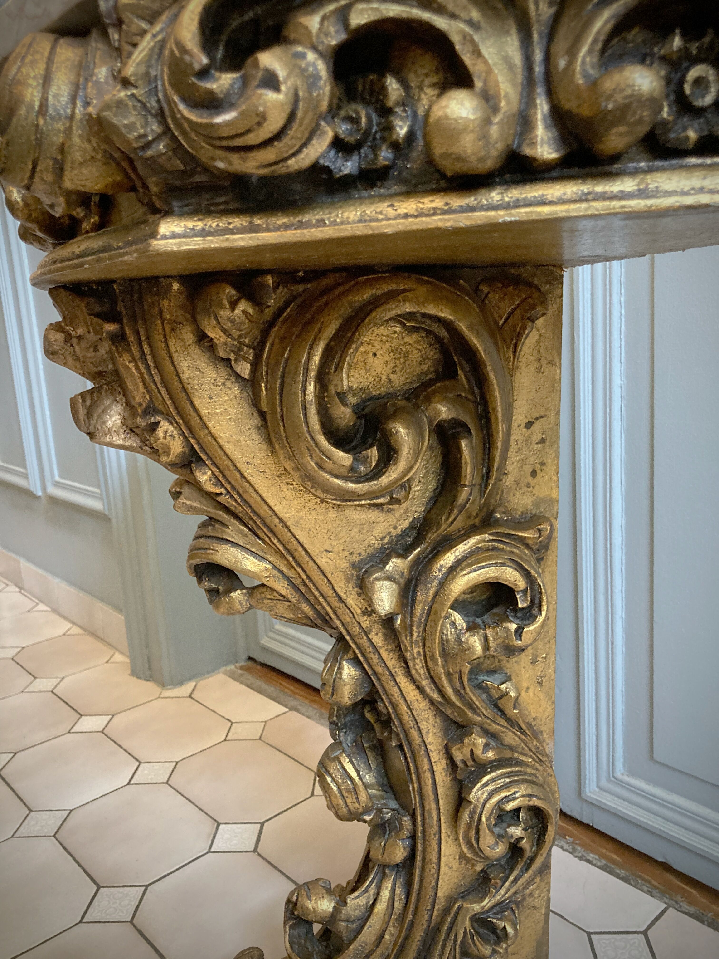Carved wooden and marble console