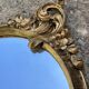 Oval mirror - wood and gilded stucco with decoration of
