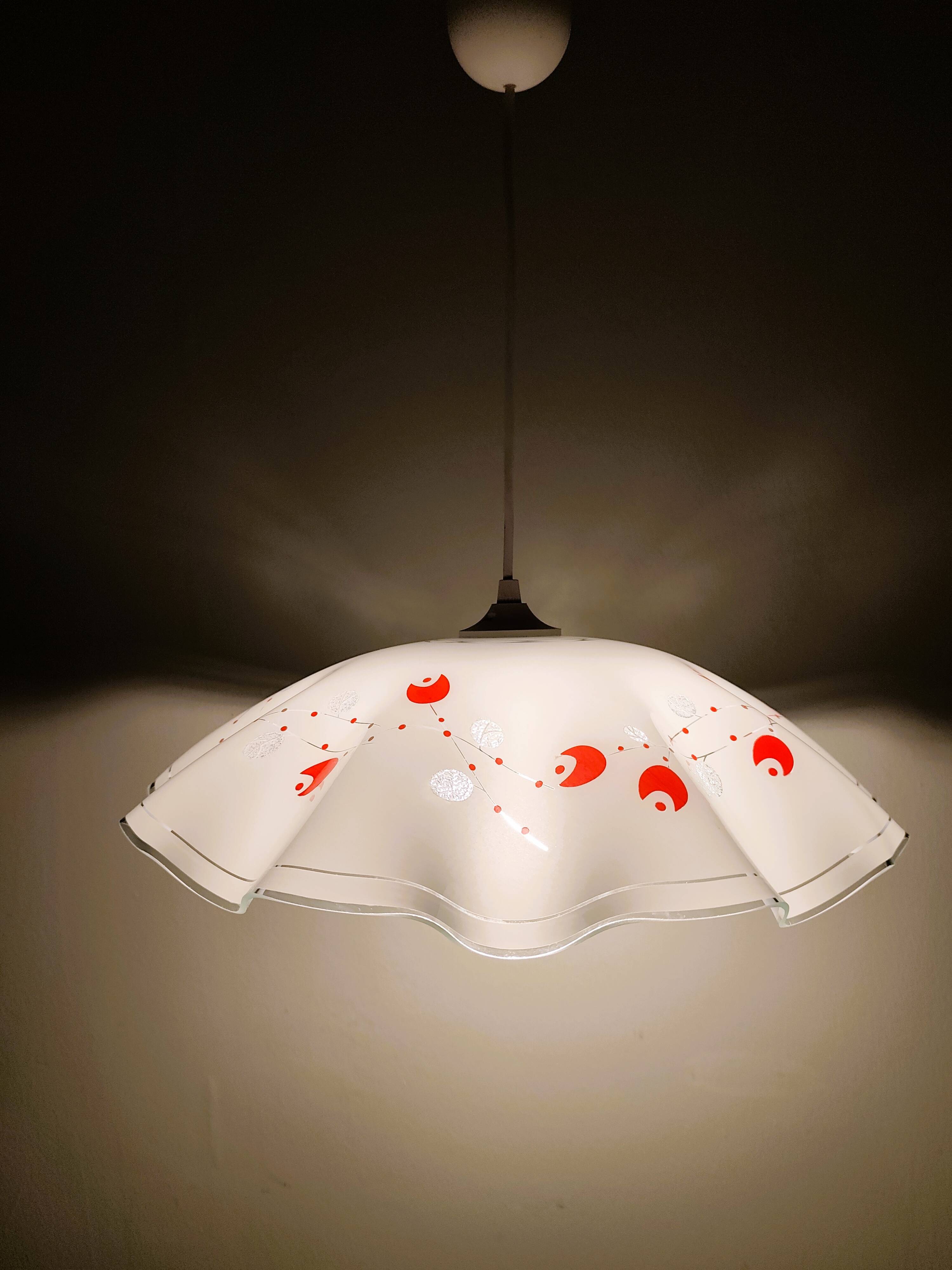 White opaline glass suspension with red and silver floral decoration.