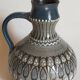 Ceramic handle vase with vintage graphic decoration