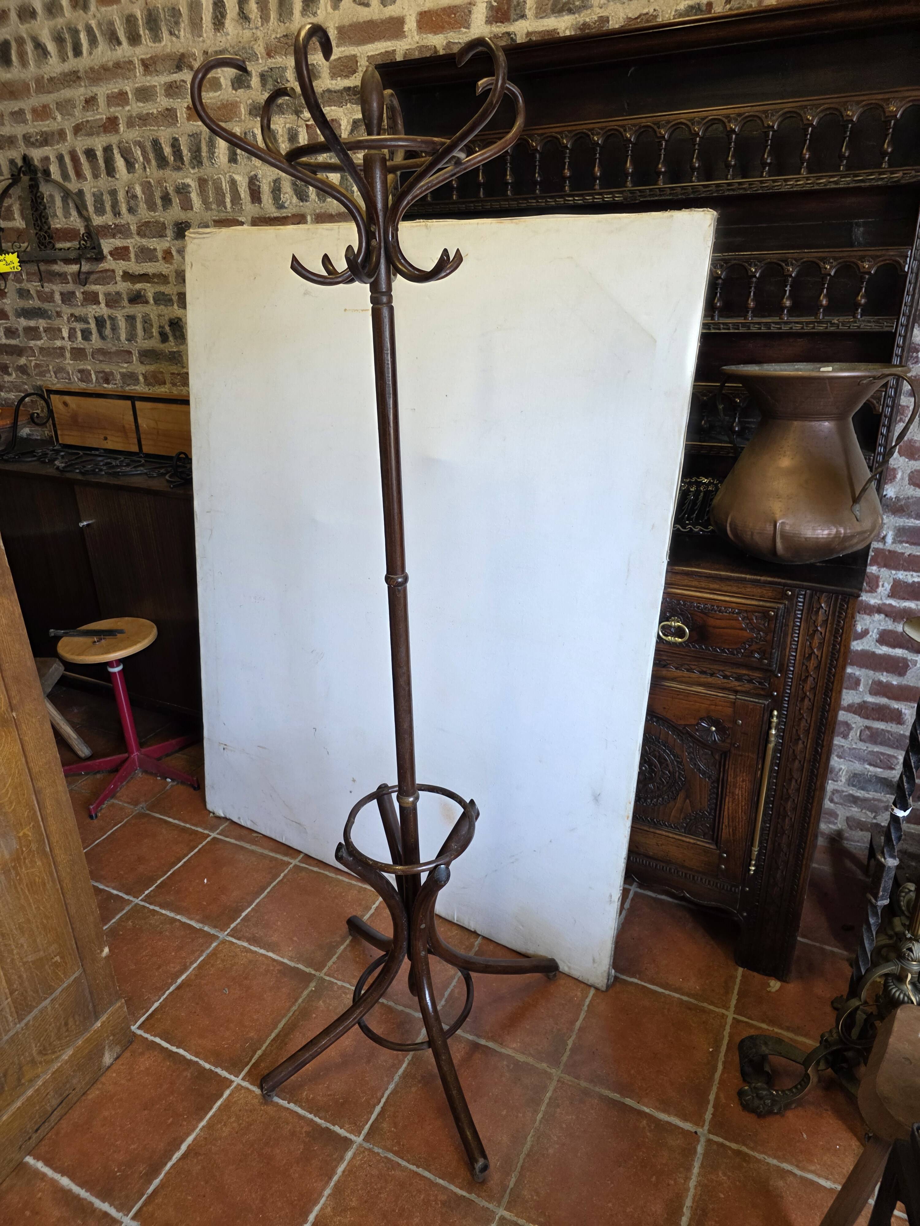 Curved antique wooden parrot