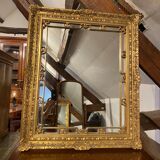 Mirror in wood and gilded stucco