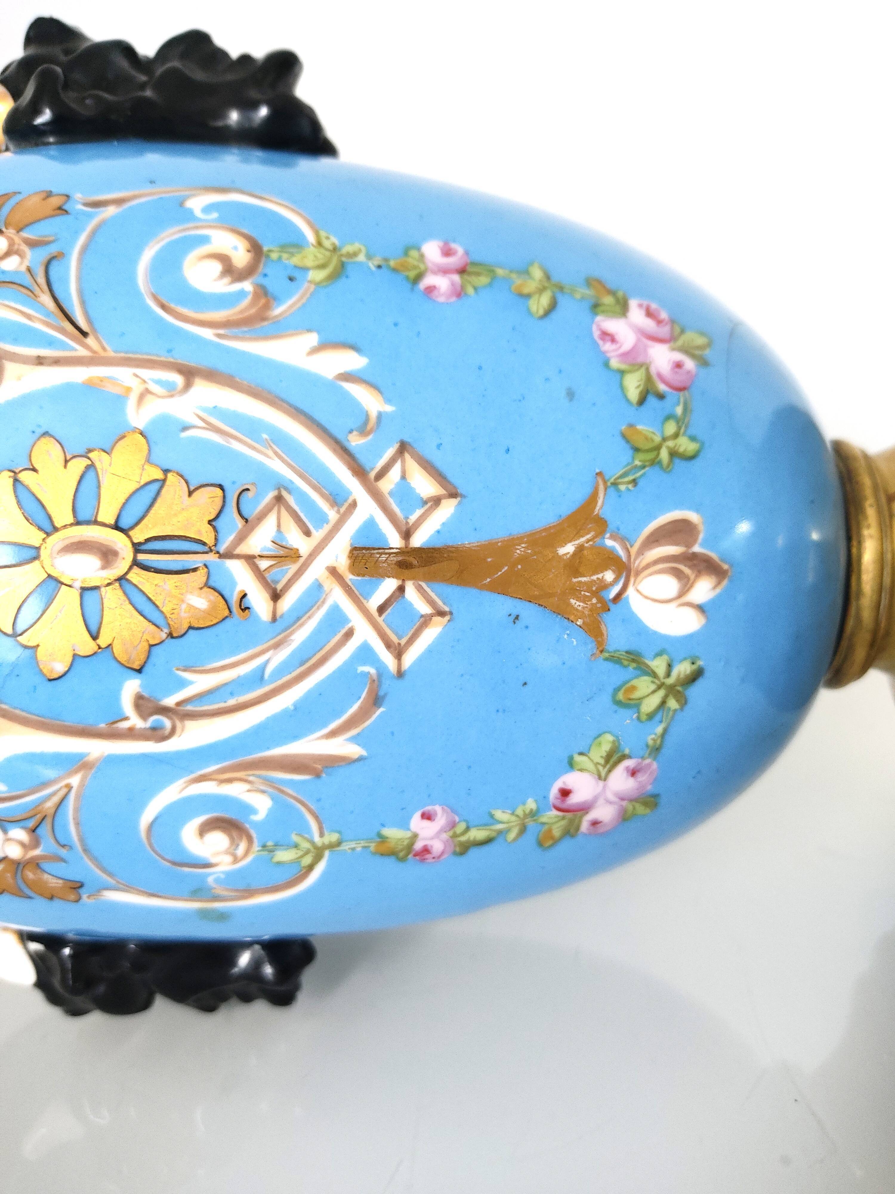 Lamp foot blue vase heads of fauna