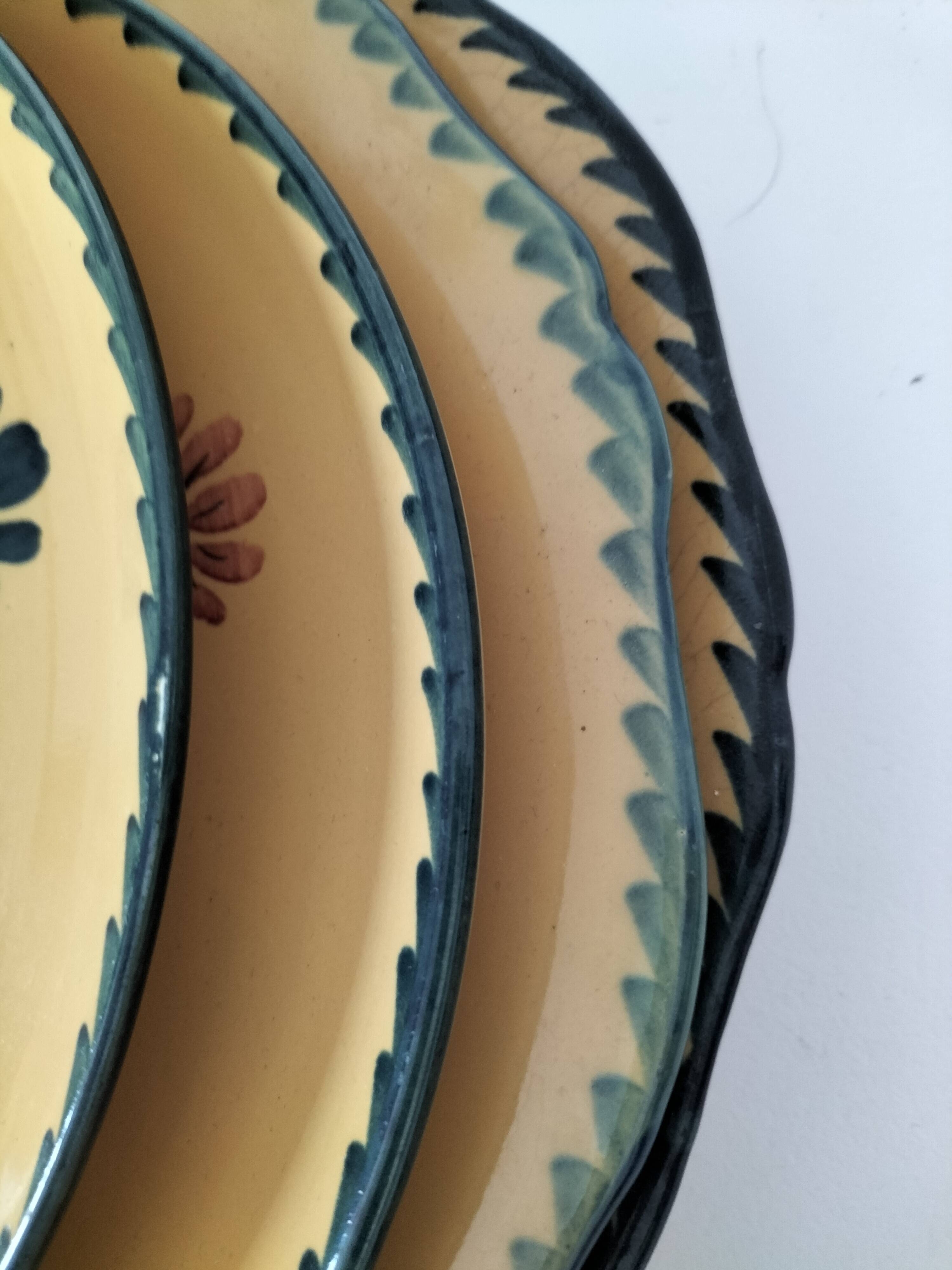 4 antique plates in hand-painted faience