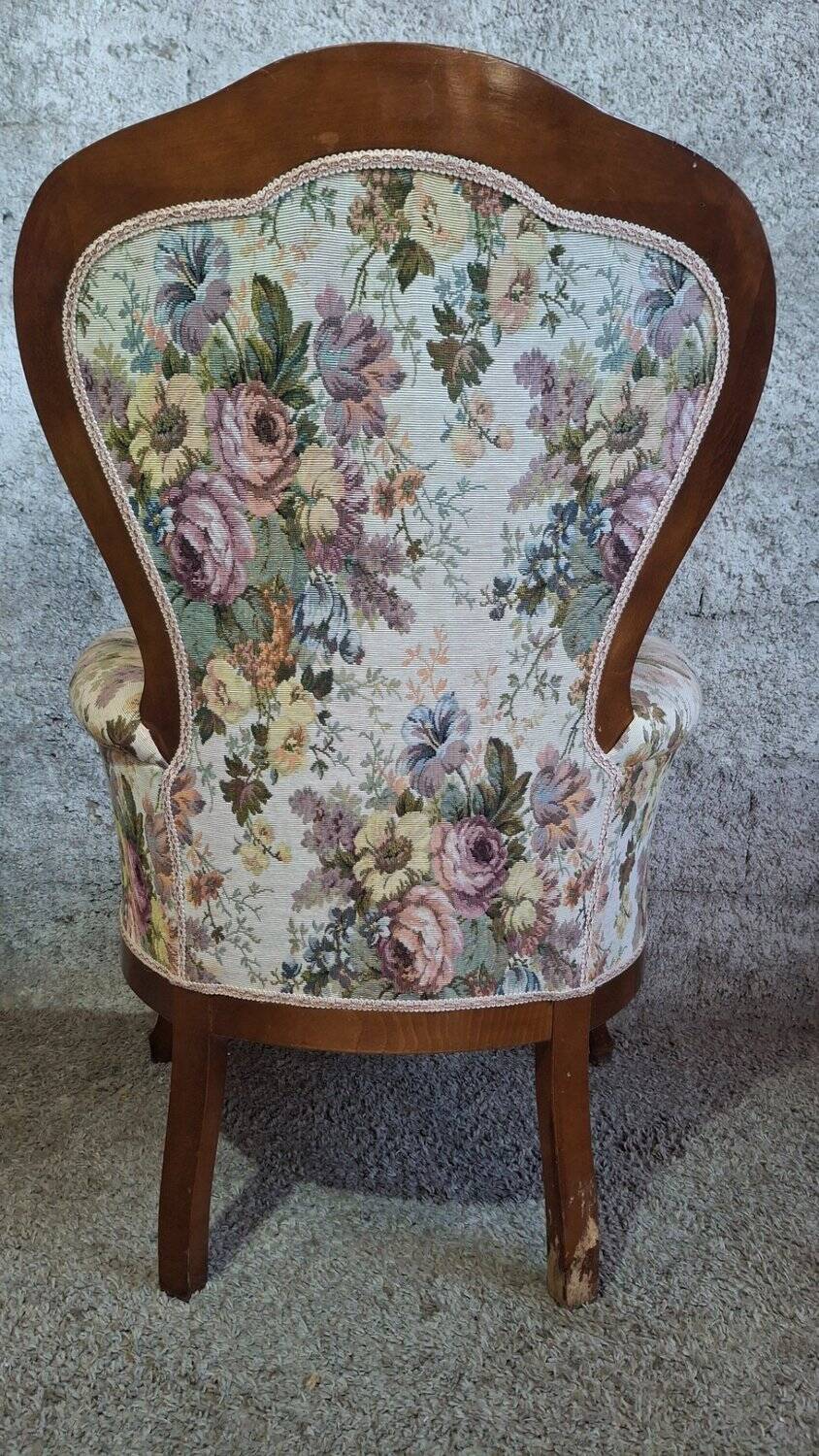 Louis XV style armchair with floral jacquard upholstery.