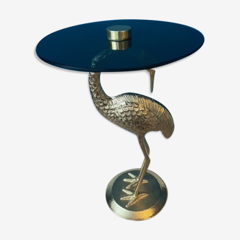 Table d’appoint ronde avec grue de couleur or en métal