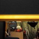 Large mirror in a golden decorative frame