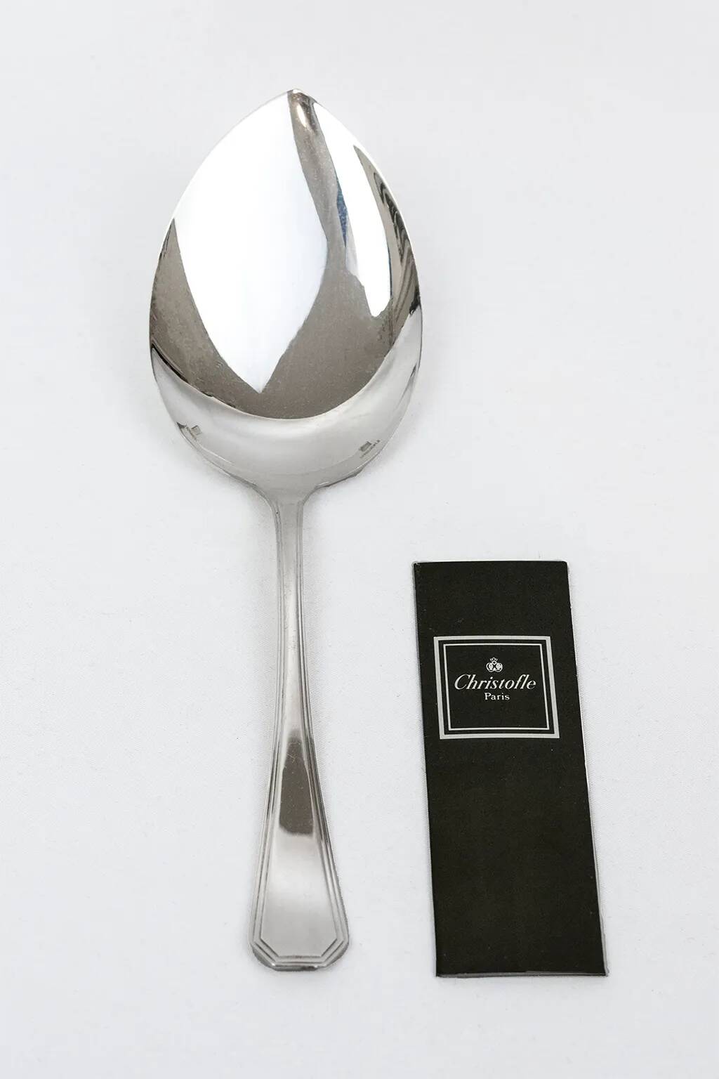 Serving spoon Christofle model America in silver-plated metal, design by Luc Lanel.