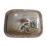 Sandstone butter maker with flower pattern