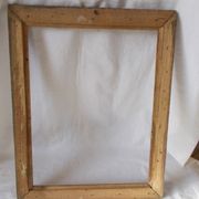 Cadre en bois doré sculpté