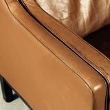 Armchair design Scandinavian brown leather.