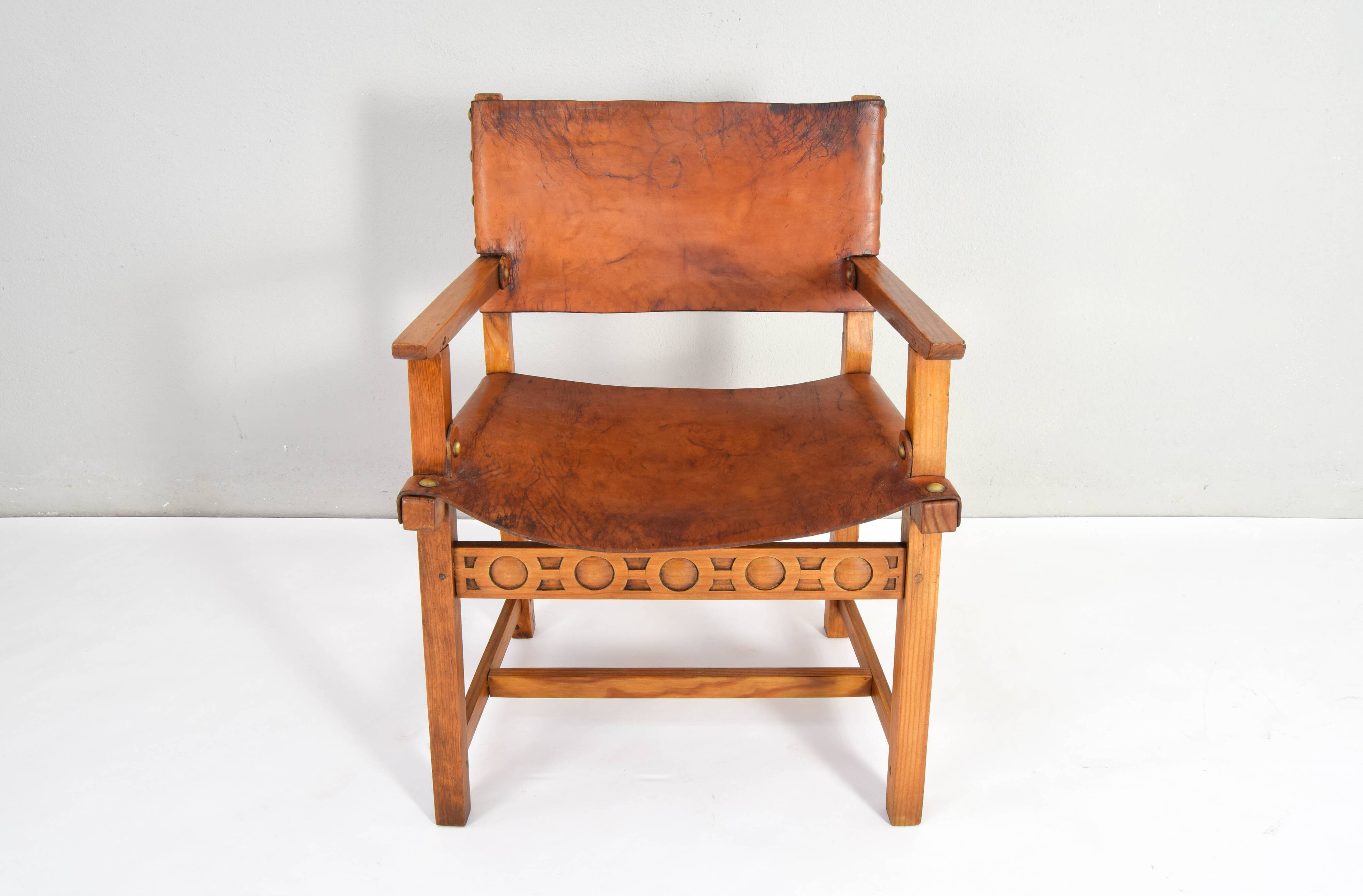 19th century oak and cognac leather brutalist castellana spanish armchair