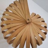 Nautilus shell-shaped chandelier made from bamboo slats