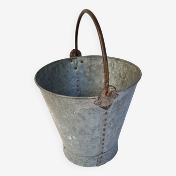 Old bucket with thick zinc handle