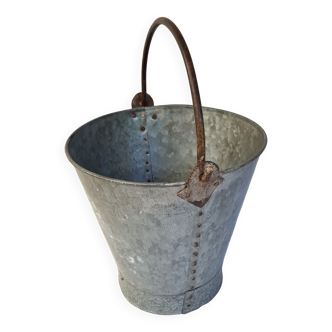 Old bucket with thick zinc handle