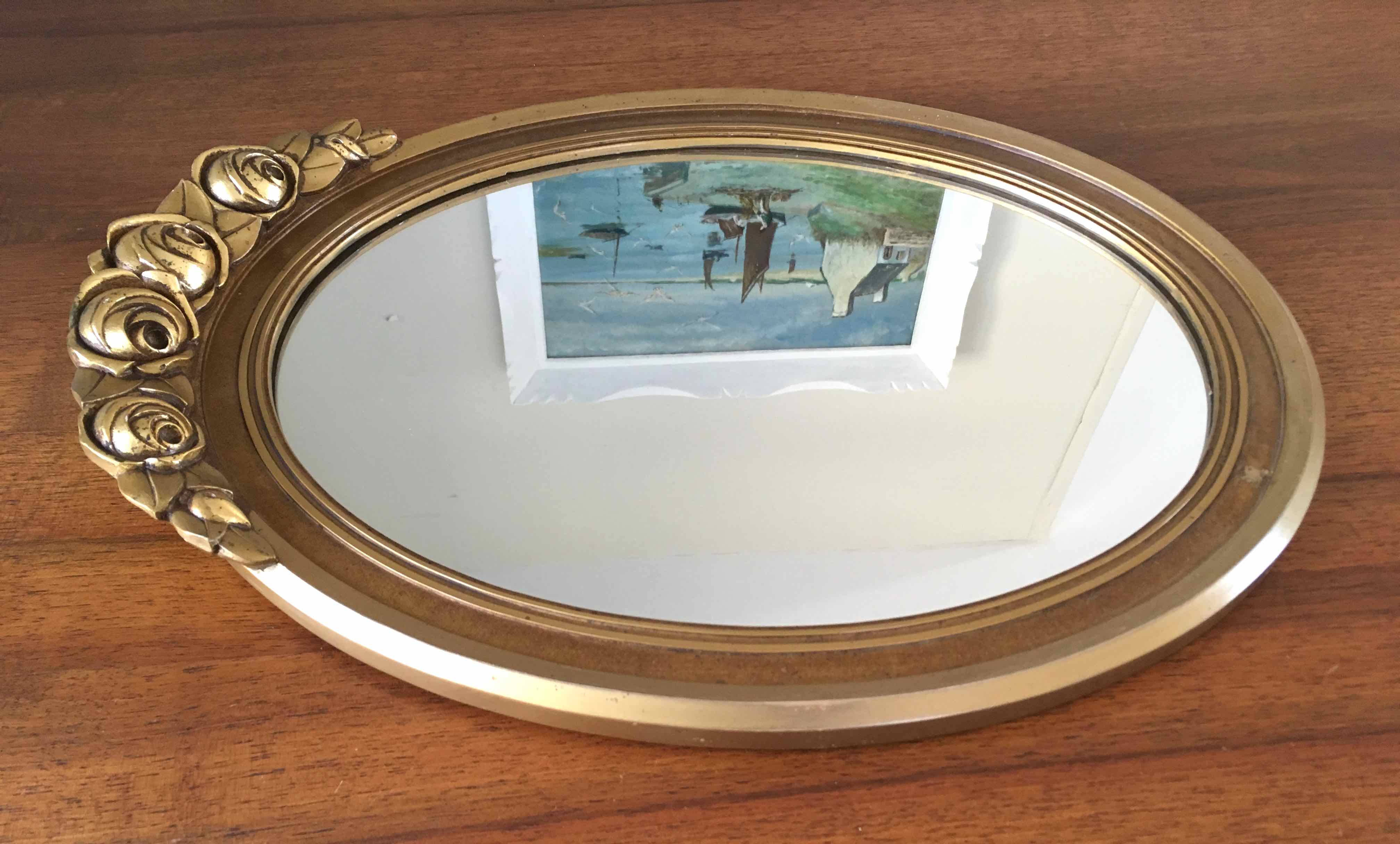 Oval mirror carved gilded wood