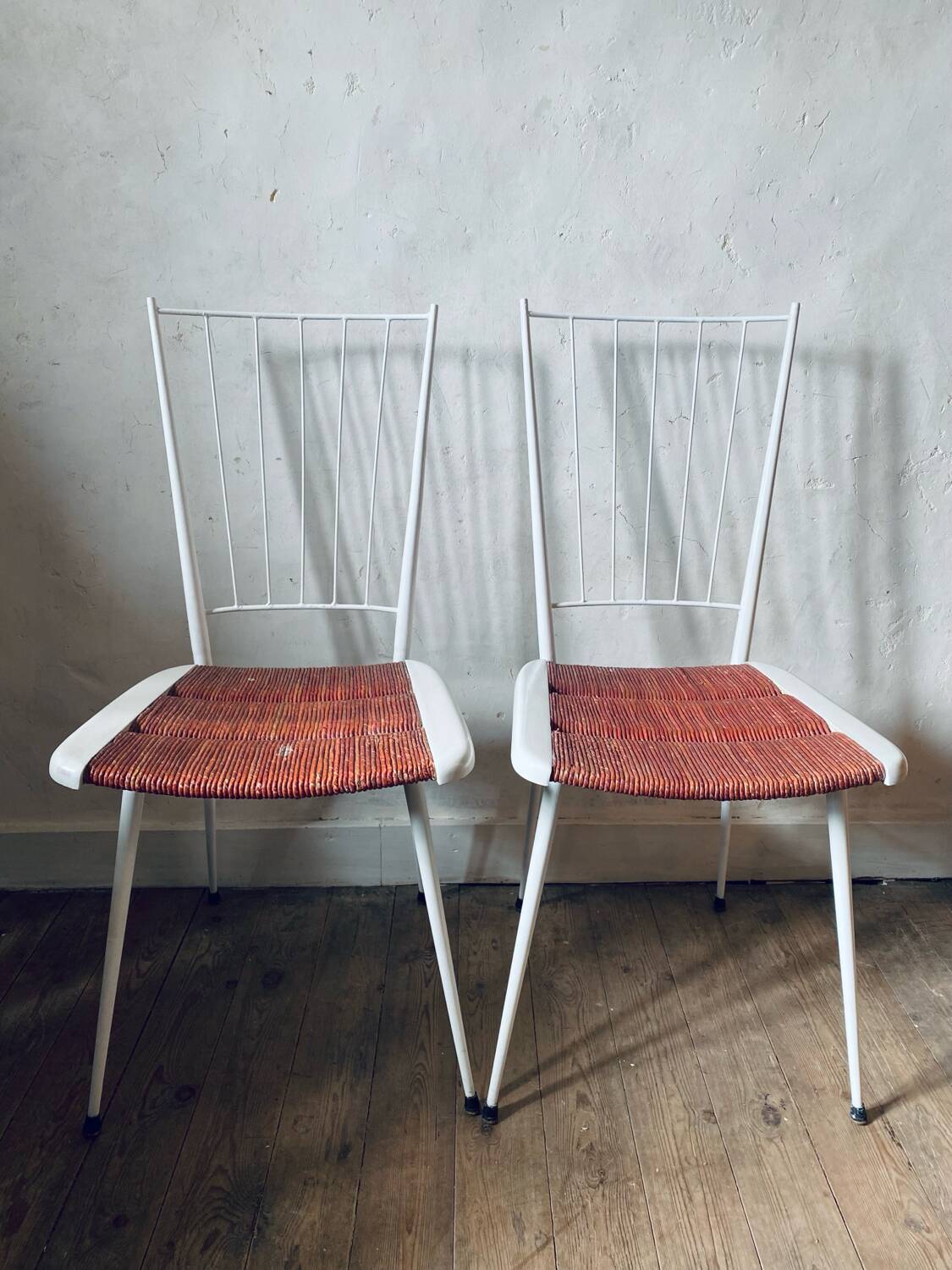 Metal and straw chairs