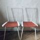 Metal and straw chairs
