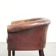 Sheepskin club armchair with patina in a subtle size and a vintage look