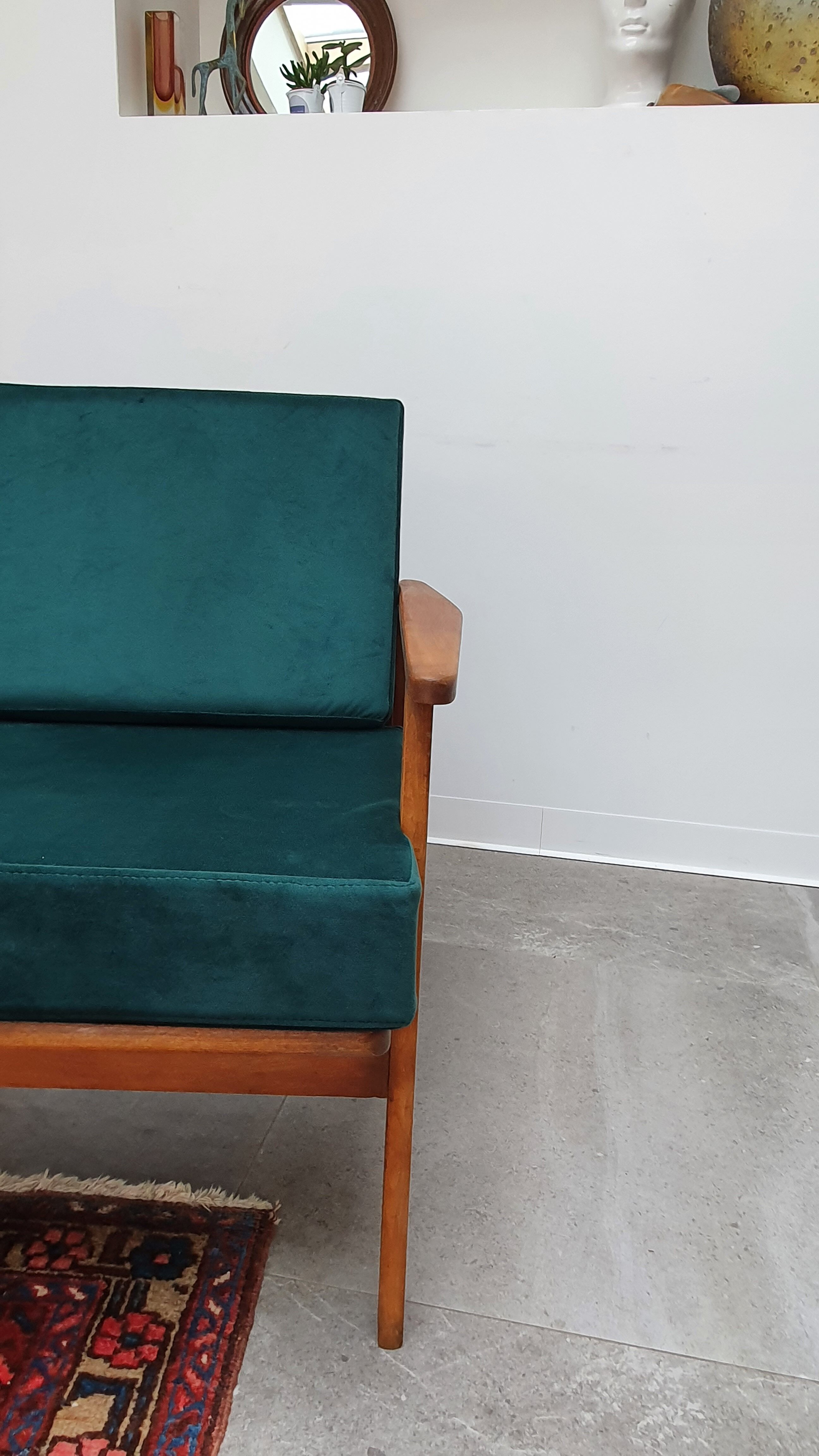 Scandinavian style armchair in forest green velvet