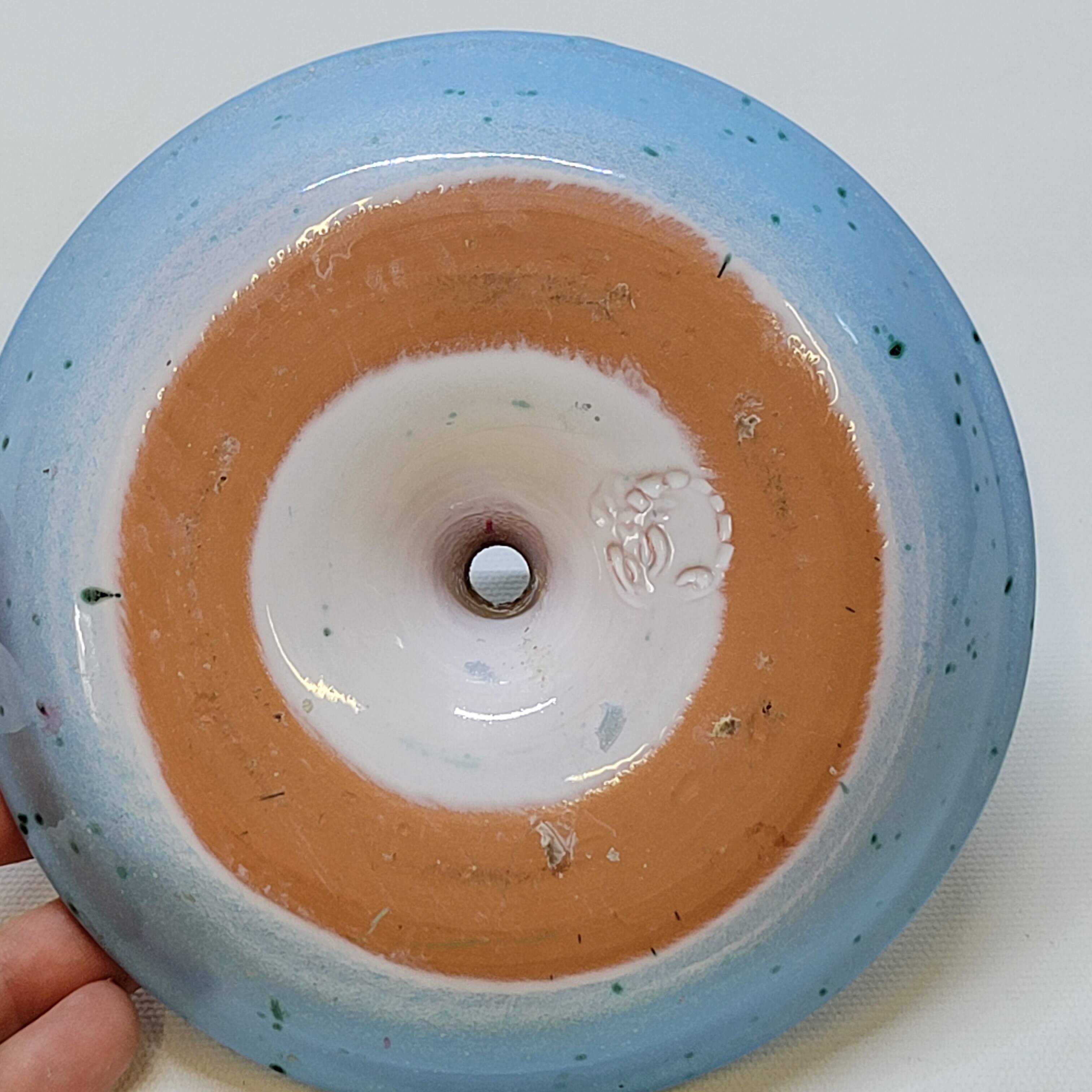 Light blue glazed ceramic candle holder with green speckled signed scorpion stamp