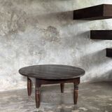 Coffee table, round antique Indonesian teak table with straight legs.