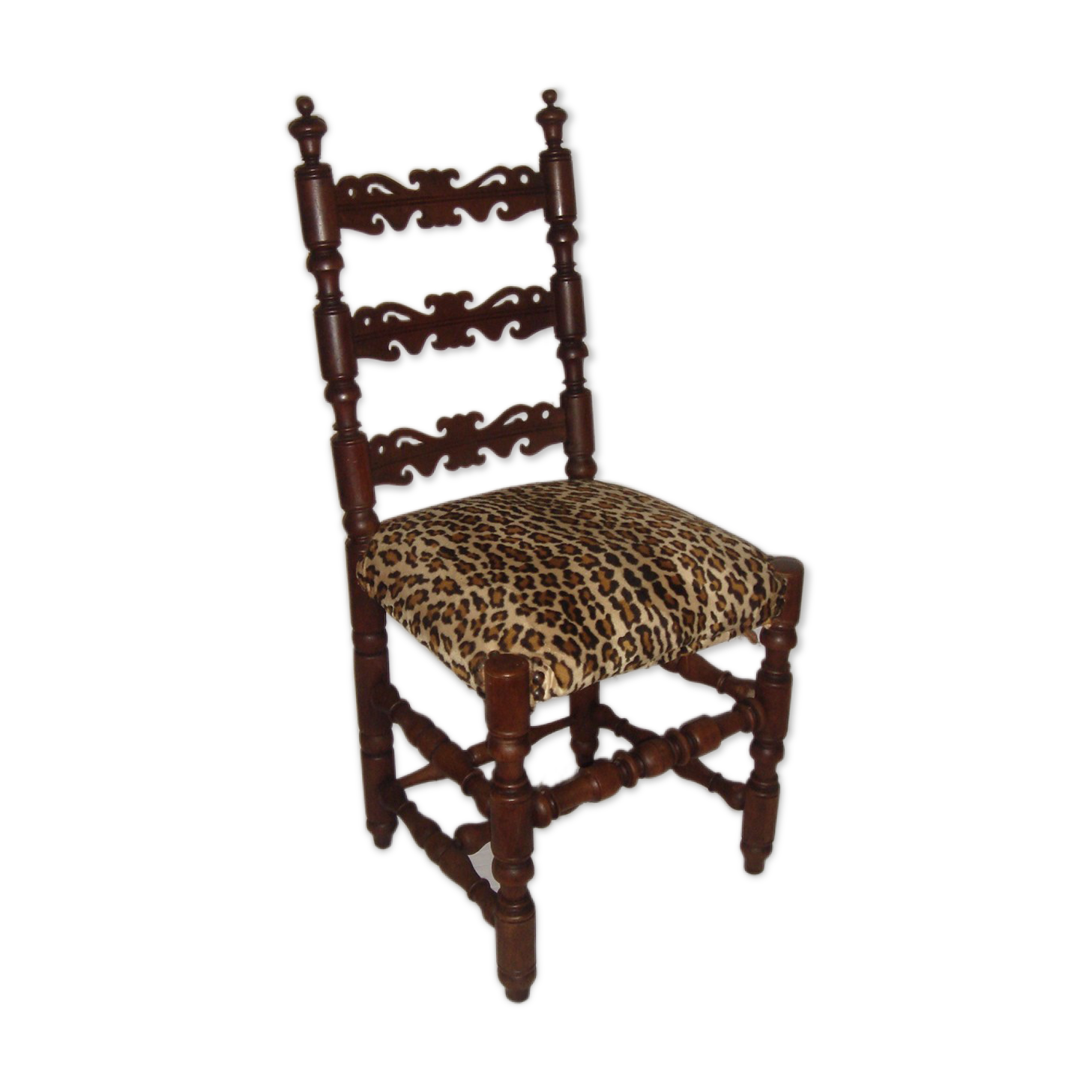 Old chair covered Leopard fabrics