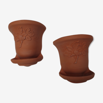 Duo of old terracotta wall flower pots