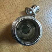 Baluster-shaped sprinkler with gadroons in silver-plated metal with 2 punches