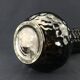 The Foulon, vase with iridescent black cover