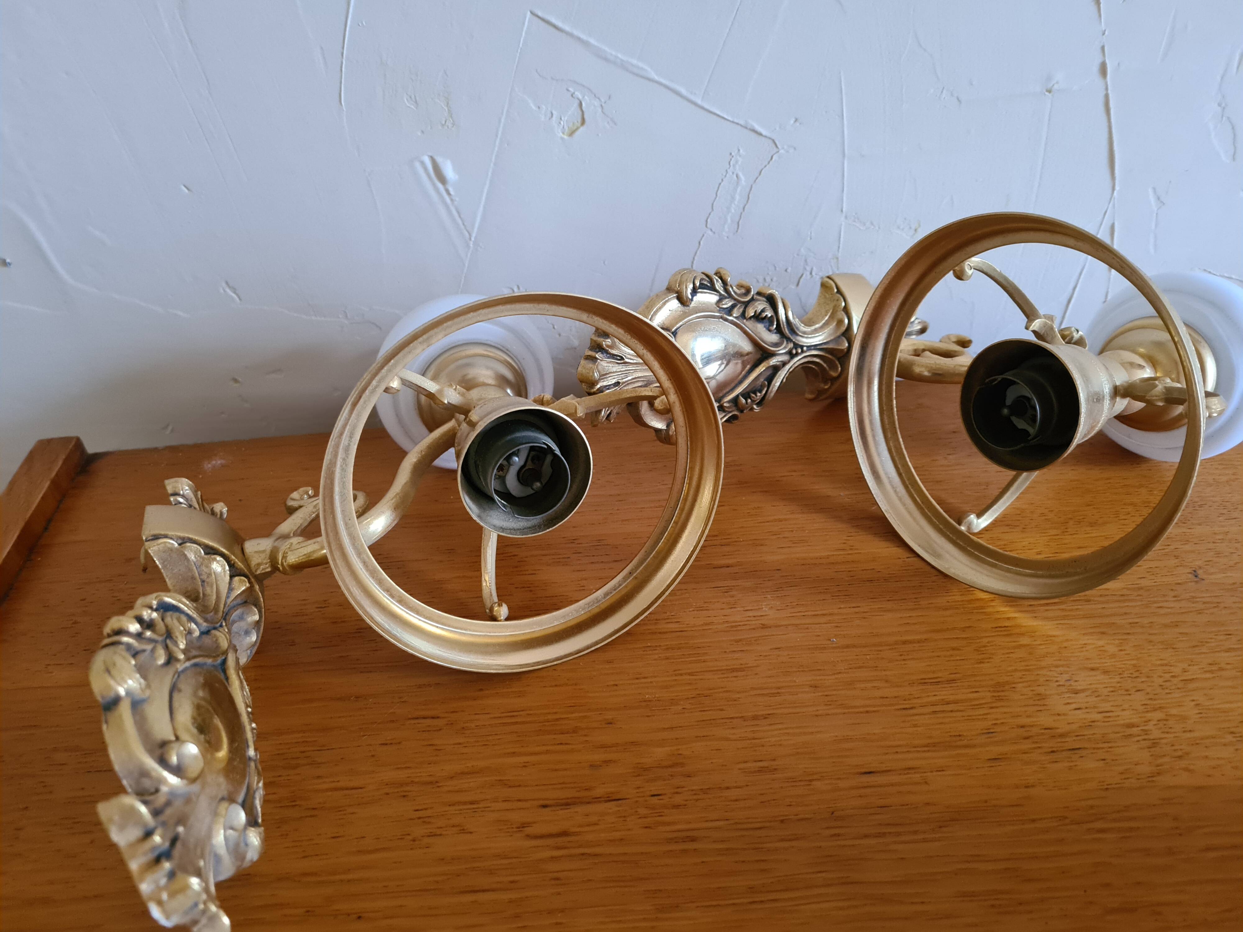 Pair of opaline and gilded brass wall lights