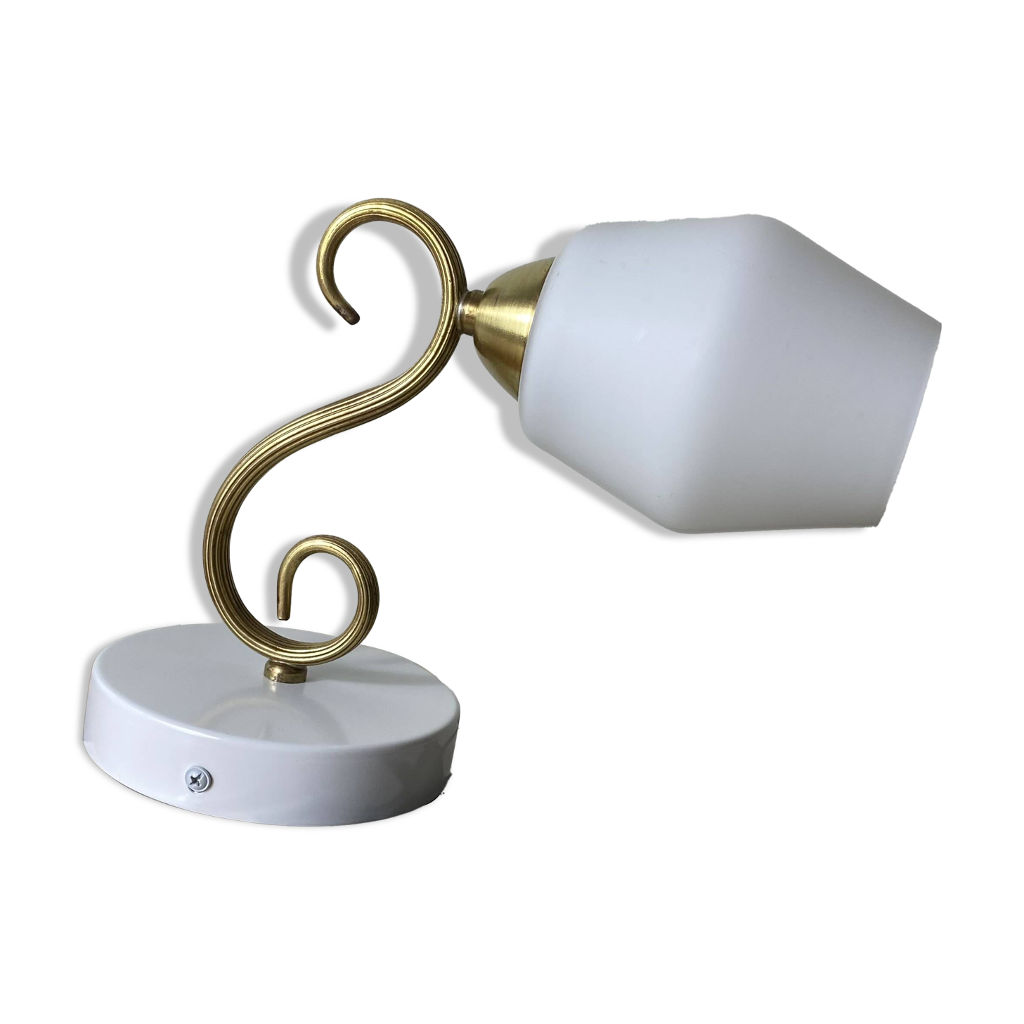 Swan neck wall light in brass with a white glass shade.