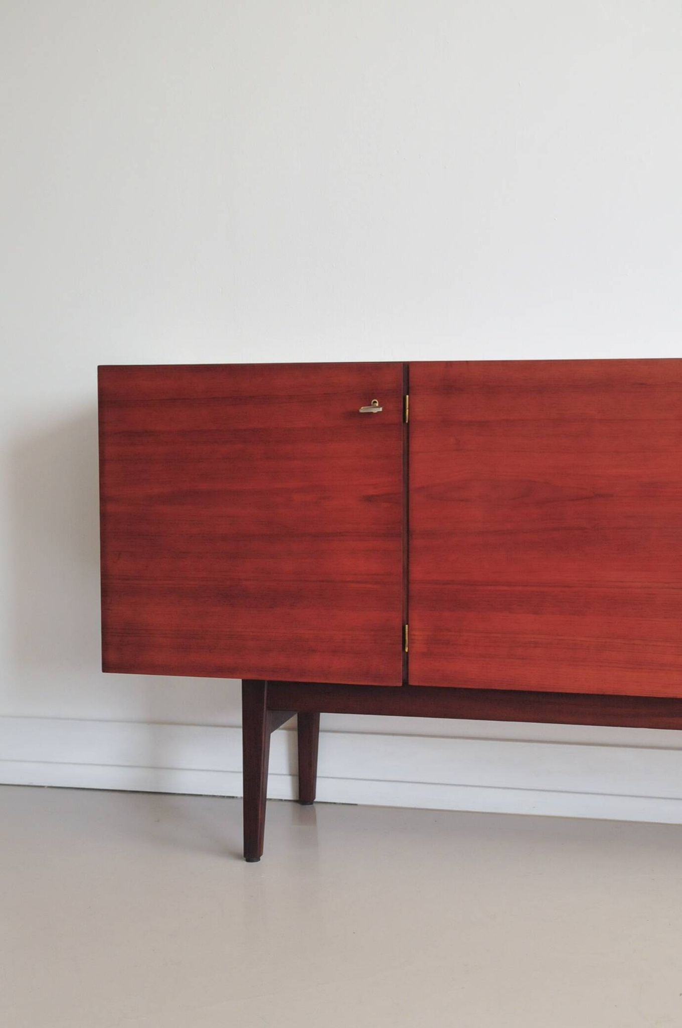 vintage Danish sideboard with black and white drawers