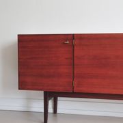 vintage Danish sideboard with black and white drawers