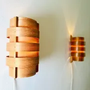 Wall sconces in pine veneer by Hans-Agne Jakobsson for Ab Ellysett, Sweden, 1960s.
