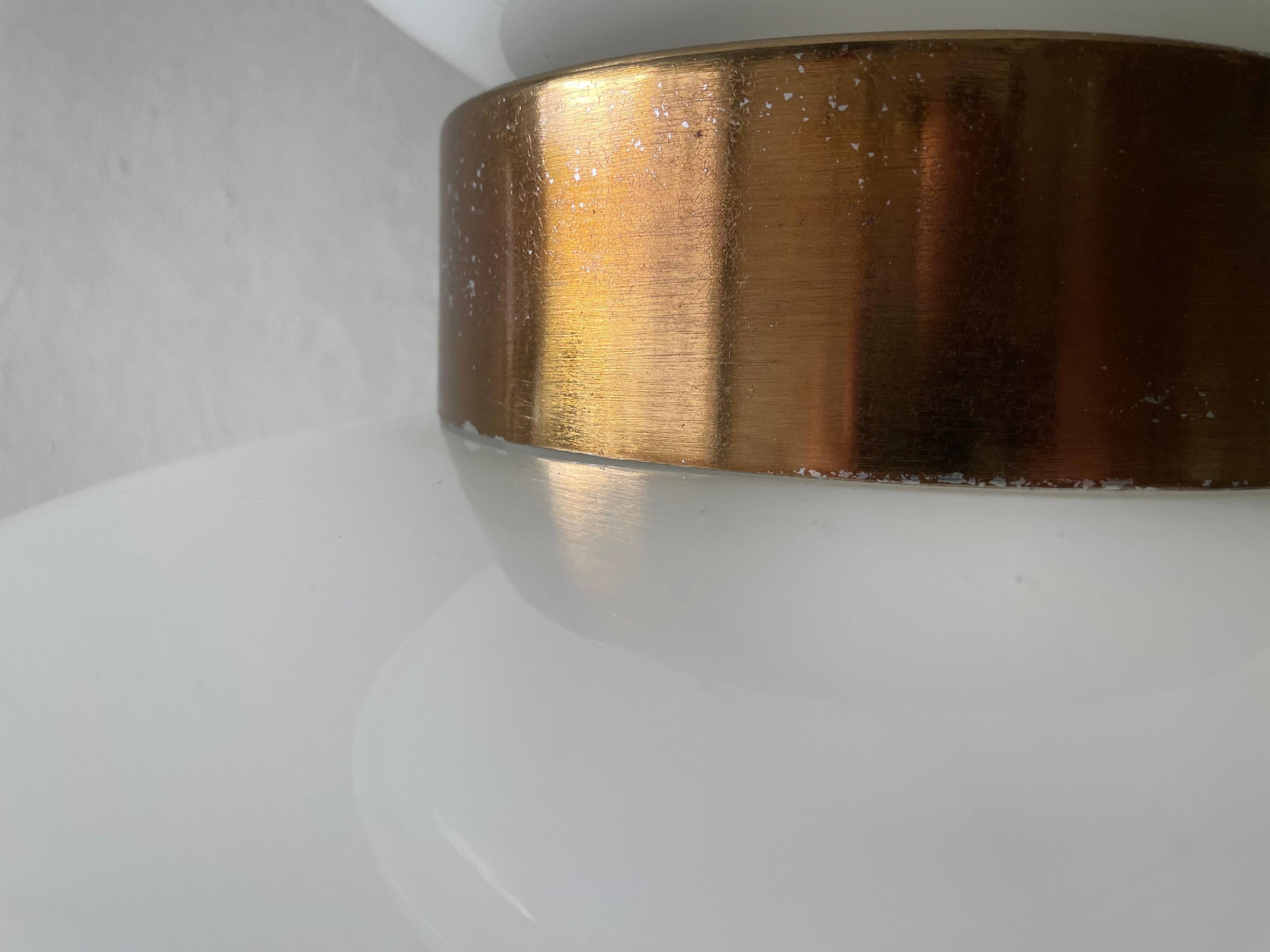 Large table lamp or floor lamp in opal glass and brass body, 1960s, Italy.