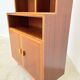 Mahogany library — closed storage and open cubbies, custom-made, 1960s.