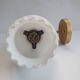 Three Empire style golden torch wall sconces