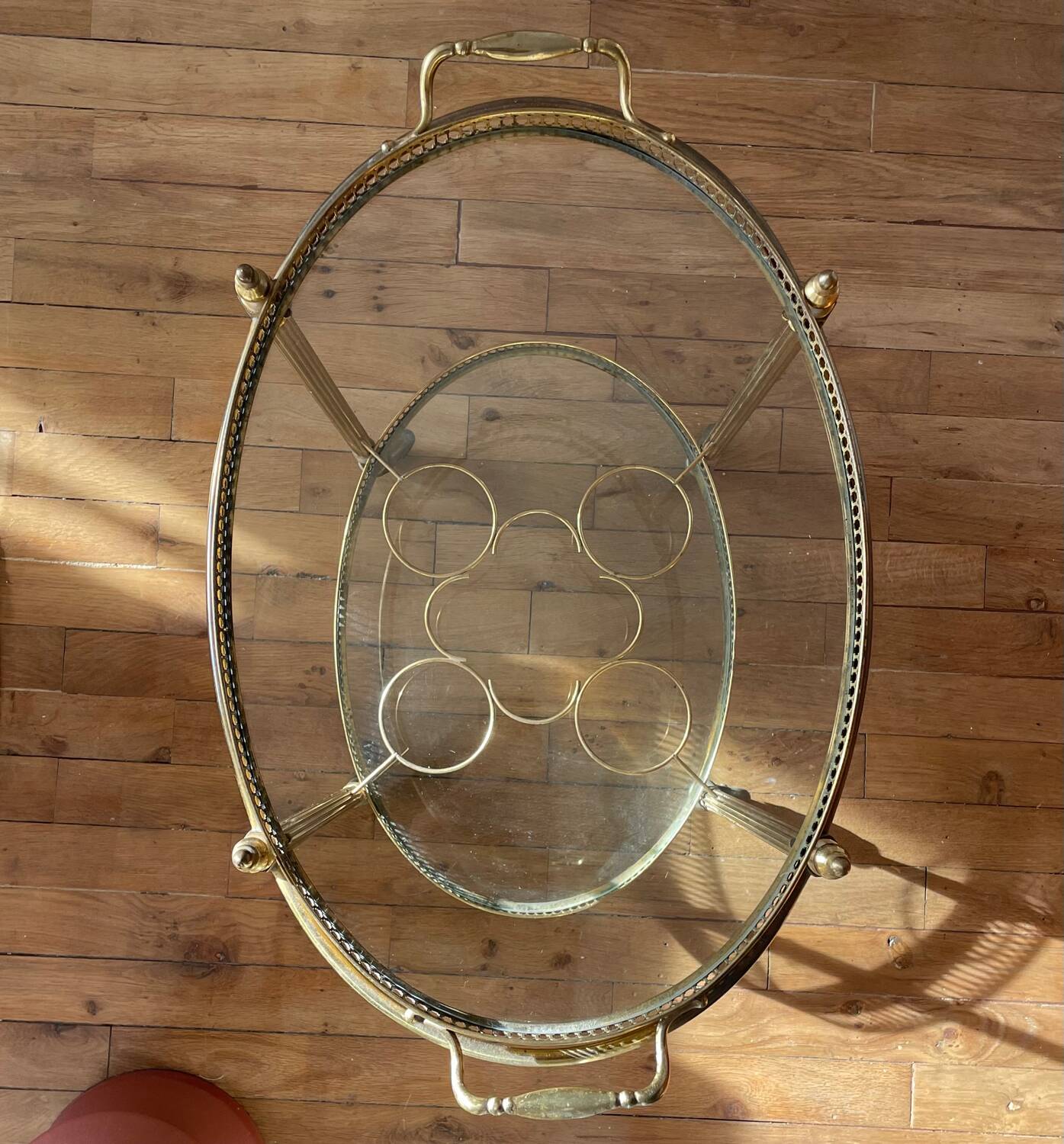 Vintage serving trolley in gilded brass and glass