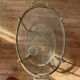 Vintage serving trolley in gilded brass and glass