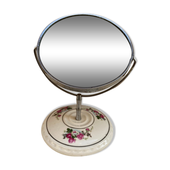 Mirror swivelling floral pattern