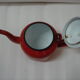 Individual teapot red enamelled steel of 1960